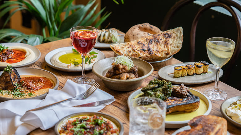 table filled with food and drinks