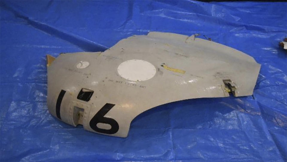 This image released by Japan Maritime Self-Defense Force shows a retrieved component which is believed to be a part of a crashed helicopter, Sunday, April 21, 2024. Initial analysis of flight data recorders recovered from the waters in the Pacific near the crash site of the two Japanese navy helicopters showed no sign that mechanical problems in the aircraft caused the accident, Japan’s defense minister said Monday, as he indicated human error. (Japan Maritime Self-Defense Force via AP)