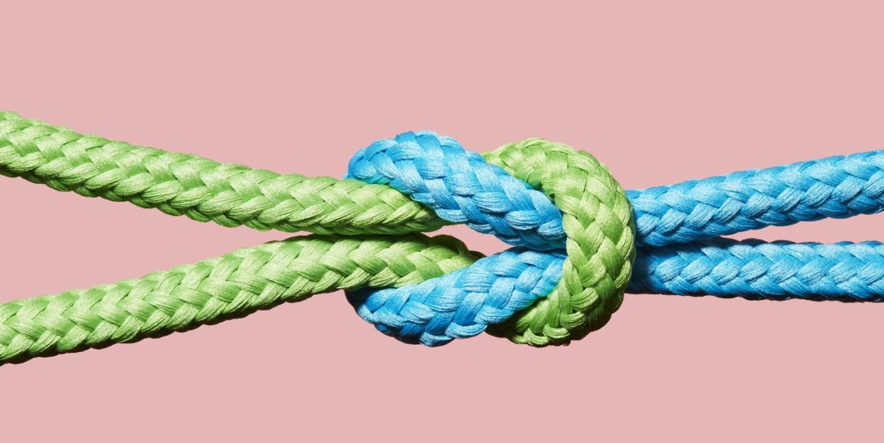 Two coloured ropes knotted together