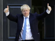 Newly elected leader of the Conservative party Boris Johnson arrives at Conservative party HQ in London, Tuesday, July 23, 2019. Brexit-hard-liner Boris Johnson, one of Britain’s most famous and divisive politicians, won the race to lead the governing Conservative Party on Tuesday, and will become the country’s next prime minister in a little over 24 hours. (Aaron Chown/PA via AP)