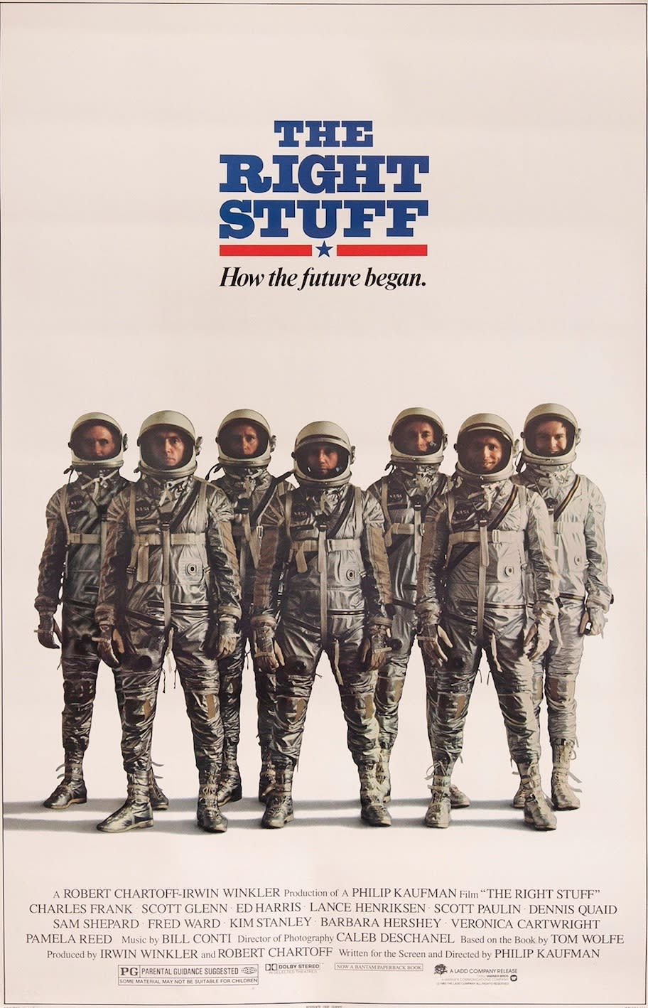 seven men in spacesuits under the words 