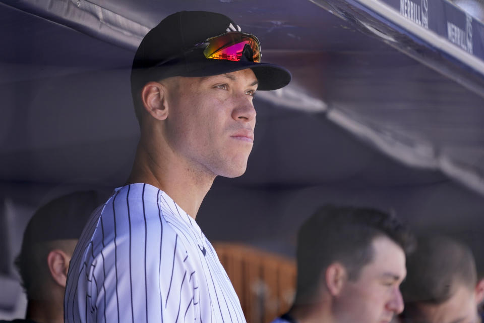 New York Yankees' Aaron Judge watches from the dugout in the seventh inning of a baseball game against the Seattle Mariners, Wednesday, Aug. 3, 2022, in New York. (AP Photo/Mary Altaffer)