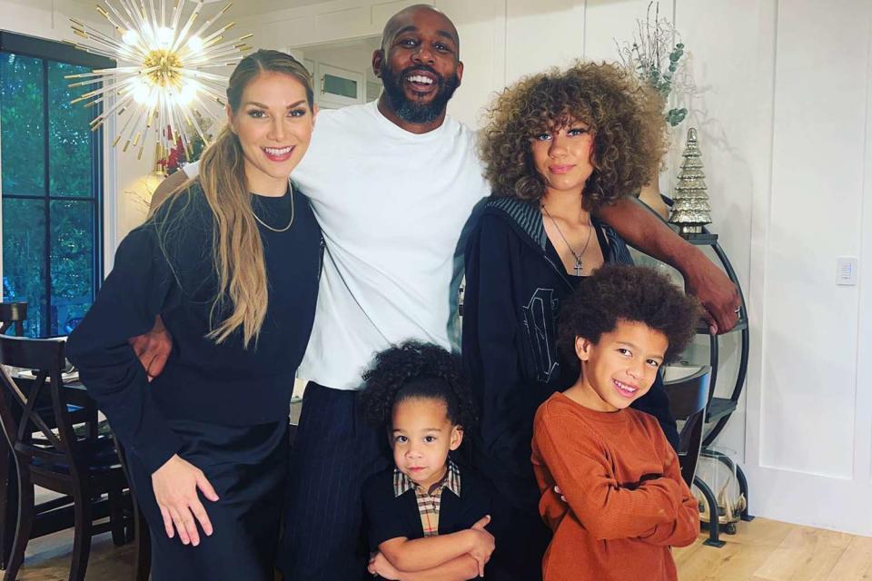 Allison Holker/Instagram Allison Holker and Stephen Boss pose with their three kids in their dining room. 