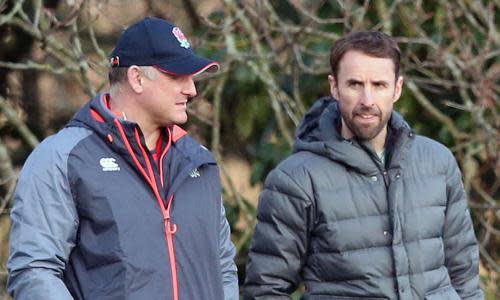 Gareth Southgate, the England football manager (right), chats with the rugby manager Richard Hill during training at Bagshot in last year’s Six Nations.