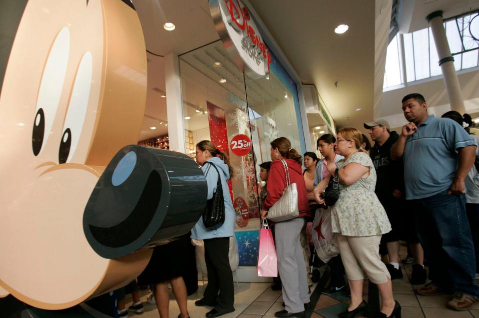 Shoppers outside the Disney Store in the Lakewood Center mall in California on Black Friday 2006.