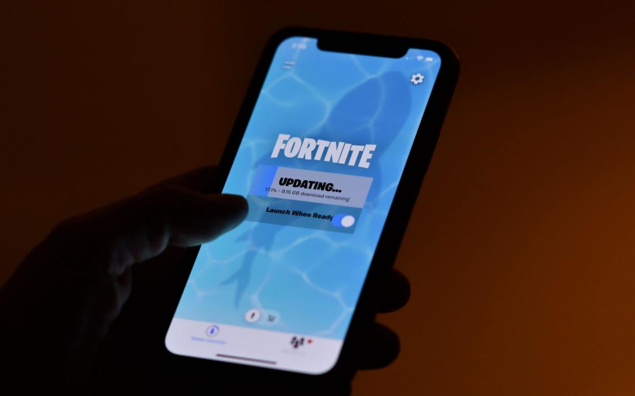 Fortnite was removed from iPhones last year - AFP