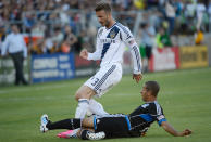 PALO ALTO, CA - JUNE 30: David Beckham #23 of the Los Angeles Galaxy battles for control of the ball with Justin Morrow #15 of the San Jose Earthquakes in the first half of their MLS soccer game at Stanford Stadium on June 30, 2012 in Palo Alto, California. (Photo by Thearon W. Henderson/Getty Images)