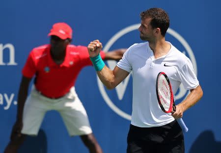 Aug 18, 2016; Mason, OH, USA; Grigor Dimitrov (BUL) reacts to defeating Stan Wawrinka (SUI) on day six during the Western and Southern tennis tournament at Linder Family Tennis Center. Mandatory Credit: Aaron Doster-USA TODAY Sports