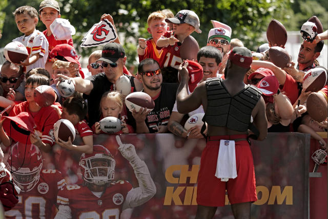 Kansas City Chiefs running back Jerrion Ealy, right, runs under pressure  from Kansas City Chiefs safety Mike Edwards during NFL football training  camp Saturday, July 29, 2023, in St. Joseph, Mo. (AP