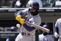 Tampa Bay Rays' Wander Franco hits a single during the first inning of a baseball game against the Chicago White Sox in Chicago, Sunday, April 17, 2022. (AP Photo/Nam Y. Huh)