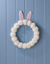 <p>Soft and plush, this wreath can be made with homemade or store-bought pom-poms.</p><p><strong>To make:</strong> Make or buy 17 large white pom-poms. Attach to a 12-inch craft ring with hot-glue. Cut ears from white and pink felt; use glue to attach together and then to the back of the craft ring.</p><p><a class="link " href="https://www.amazon.com/Bright-Creations-Wedding-Floral-Natural/dp/B07Z8KDMBF/ref=sr_1_8?tag=syn-yahoo-20&ascsubtag=%5Bartid%7C10050.g.1111%5Bsrc%7Cyahoo-us" rel="nofollow noopener" target="_blank" data-ylk="slk:SHOP CRAFT RING;elm:context_link;itc:0;sec:content-canvas">SHOP CRAFT RING</a></p>