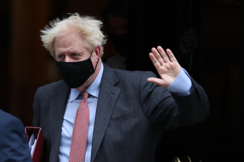 Prime Minister Boris Johnson leaves 10 Downing Street to attend Prime Minister's Questions, at the Houses of Parliament, London. (Photo by Yui Mok/PA Images via Getty Images)