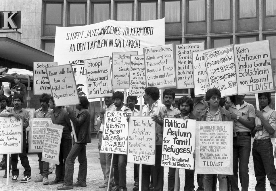 FILE - Members of the Tamil minority, who fled to West Berlin and demanded political asylum, protest on Aug. 7, 1983, when Sri Lanka's civil war broke out. Sri Lanka's Tamil people still live in the shadow of defeat in the civil war that tore the country apart until it ended 15 years ago. (AP Photo/Elke Bruhn Hoffmann, File)