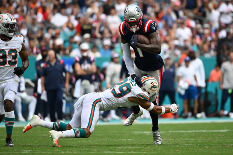 New England Patriots wide receiver DeVante Parker (R) runs against the Miami Dolphins on Sunday at Hard Rock Stadium in Miami Gardens, Fla. Photo by Larry Marano/UPI