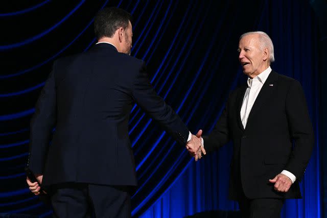 <p>Getty</p> Jimmy Kimmel (left) and Joe Biden shake hands at a fundraising event in Los Angeles on June 15, 2024