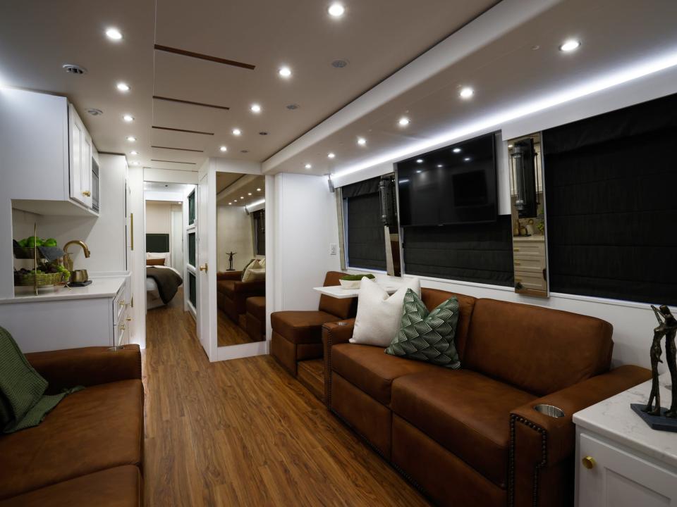 living room inside star bus with Dreamliner Luxury Coaches