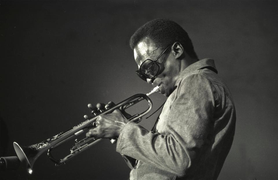 <em>Kind of Blue</em>. Miles Davis at the Schaefer Music Festival at Central Park, New York, New York, 1969. (Credit: Jack Vartoogian/Getty Images)