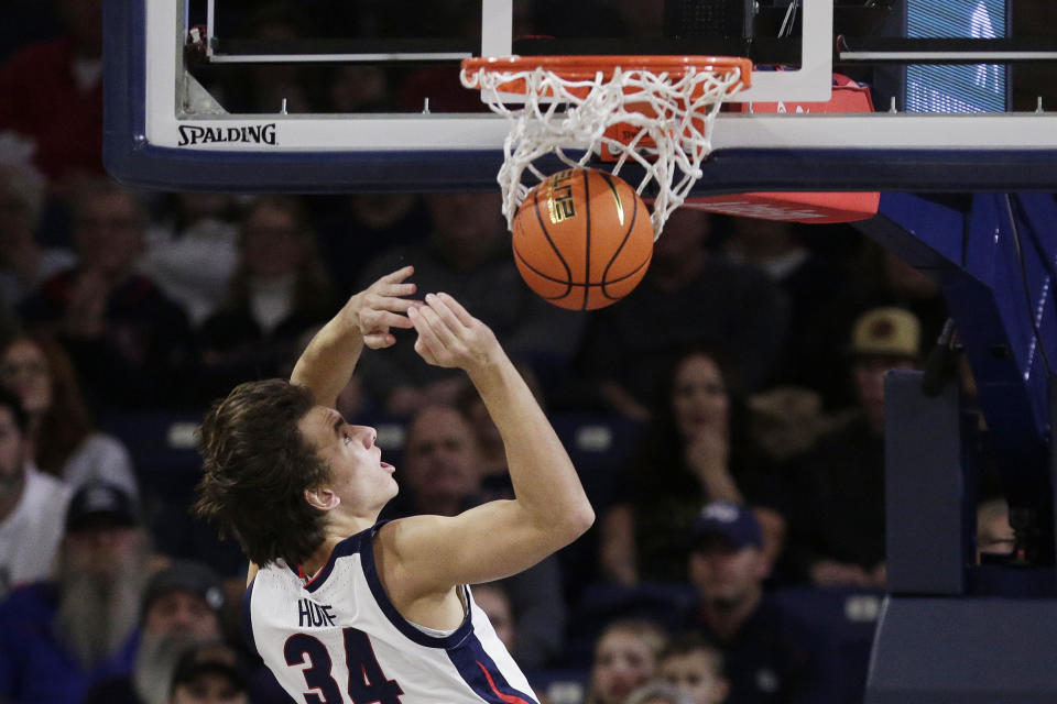 Gonzaga forward Braden Huff dunks during the first half of an NCAA college basketball game against Jackson State, Wednesday, Dec. 20, 2023, in Spokane, Wash. (AP Photo/Young Kwak)