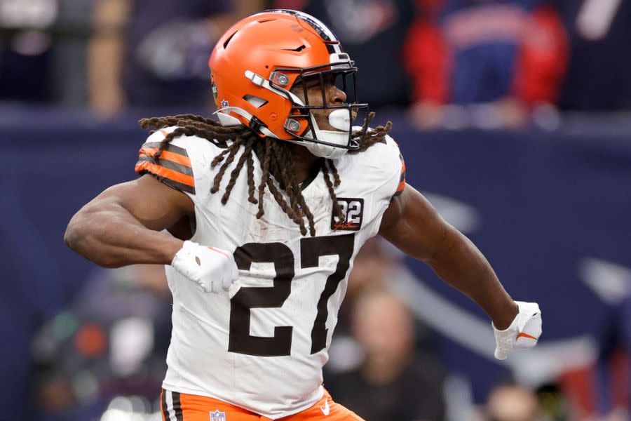 HOUSTON, TEXAS – JANUARY 13: Kareem Hunt #27 of the Cleveland Browns celebrates after scoring a touchdown against the Houston Texans during the first quarter in the AFC Wild Card Playoffs at NRG Stadium on January 13, 2024 in Houston, Texas. (Photo by Carmen Mandato/Getty Images)