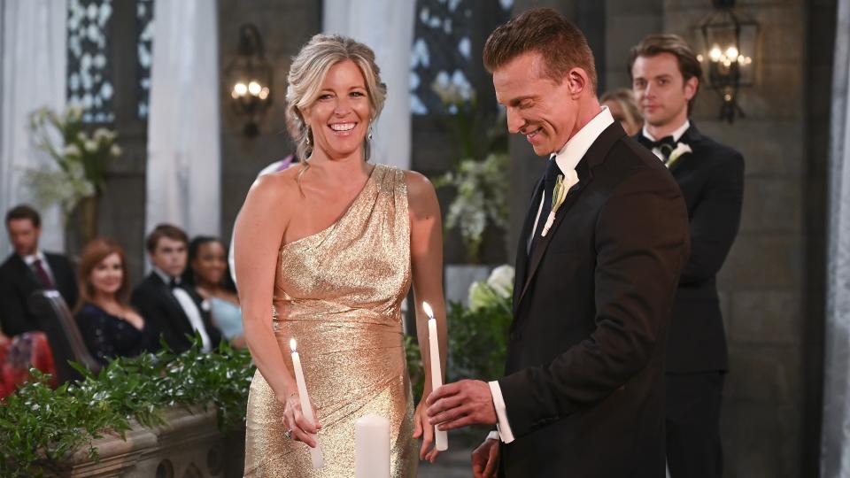 Laura Wright and Steve Burton as Carly and Jason smiling on their wedding day in General Hospital