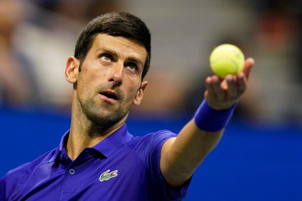 Novak Djokovic overcame an off-court distraction to book his place in the US Open third round (Frank Franklin II/AP) (AP)
