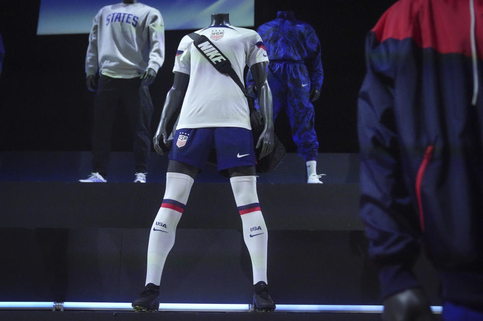A new uniform, center, for the U.S. women's World Cup soccer team is displayed by Nike, Wednesday, Aug. 31, 2022, in New York. (AP Photo/Bebeto Matthews)