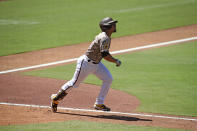 San Diego Padres Francisco Mejía hits a two-run home run against the Arizona Diamondbacks' in the third inning of a baseball game Sunday, Aug. 9, 2020, in San Diego. (AP Photo/Derrick Tuskan)