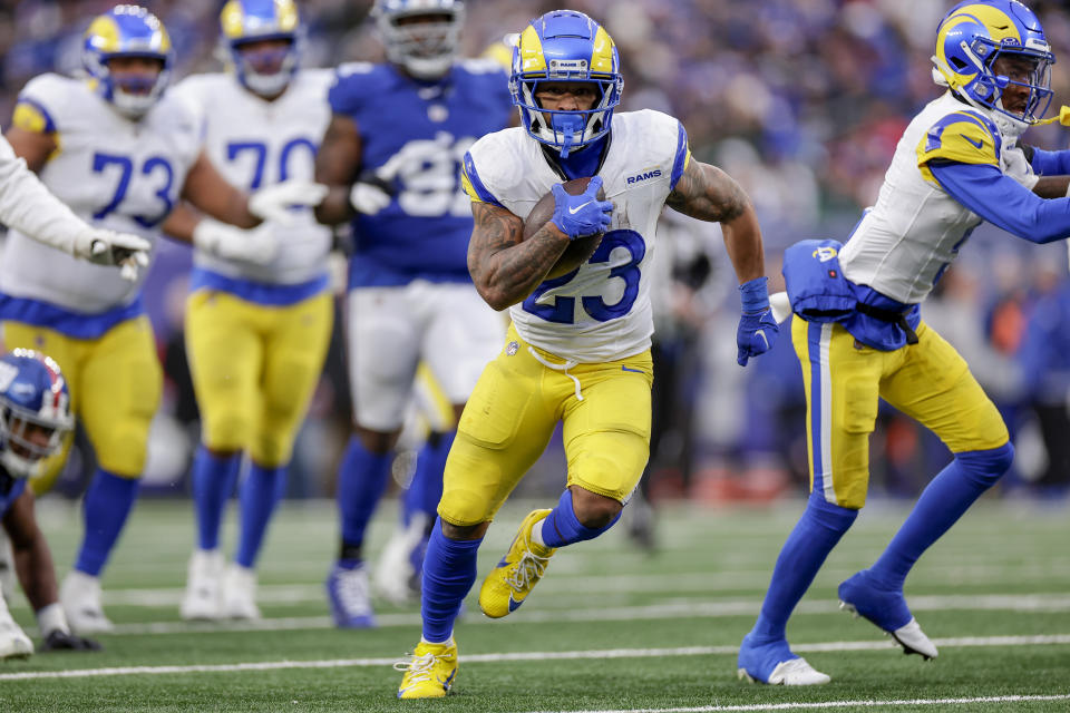 Los Angeles Rams running back Kyren Williams (23) runs in a touchdown during the second half an NFL football game against the New York Giants, Sunday, Dec. 31, 2023, in East Rutherford, N.J. (AP Photo/Adam Hunger)