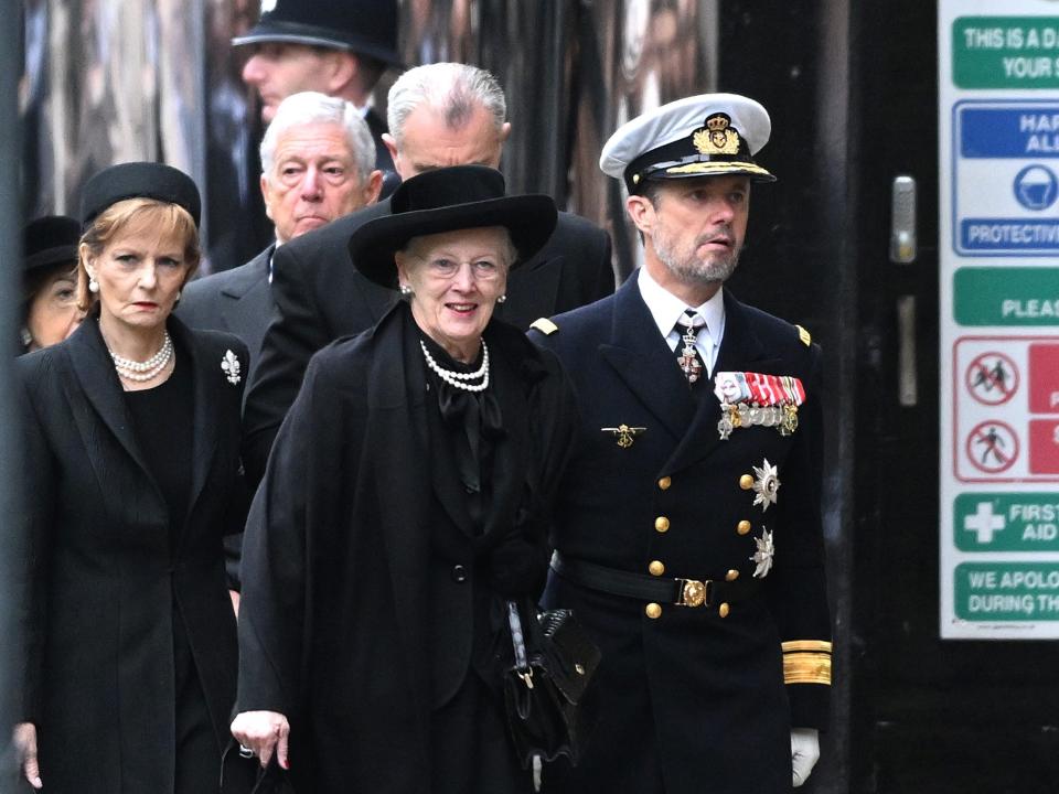 Margrethe II of Denmark and Frederik, Crown Prince of Denmark arrive for the State Funeral of Queen Elizabeth II at Westminster Abbey on September 19, 2022 in London.