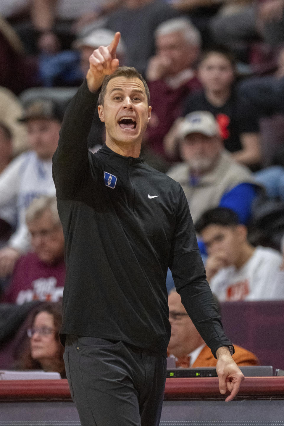 Duke head coach Jon Scheyer reacts during the second half of an NCAA college basketball game against Virginia Tec, Monday, Jan. 29, 2024, in Blacksburg, Va. (AP Photo/Robert Simmons)