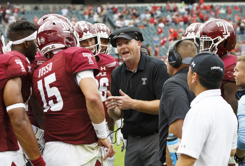 Temple head coach Rod Carey talks things over with his team before the final play in the second half of an NCAA college football against Maryland, Saturday, Sept. 14, 2019, in Philadelphia. Temple won 20-17. (AP Photo/Chris Szagola)