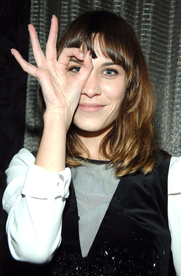 Celebrity photos: Alexa Chung struck a cute pose at the Jesse Frohman Kurt Cobain photography exhibition in New York this week. Girl crush alert.