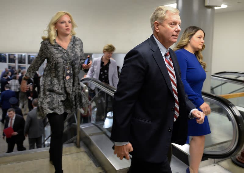 Sen. Lindsey Graham (R-SC) walks up the stairs from the Senate subway on his way to the Senate impeachment trial of President Donald Trump in Washington