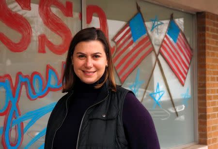 Democratic U.S. Representative candidate in Michigan's 8th congressional district Elissa Slotkin poses at her campaign office in Lansing, during the midterm elections, Michigan, U.S., November 6, 2018. REUTERS/Jeff Kowalsky/Files