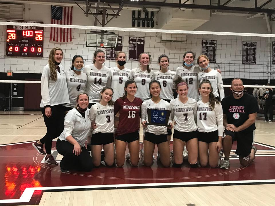 Ridgewood earned its second consecutive North 1, Group 4 girls volleyball championship trophy with a 25-22, 28-26 victory over Clifton on Tuesday, Nov. 9, 2021 in Ridgewood.