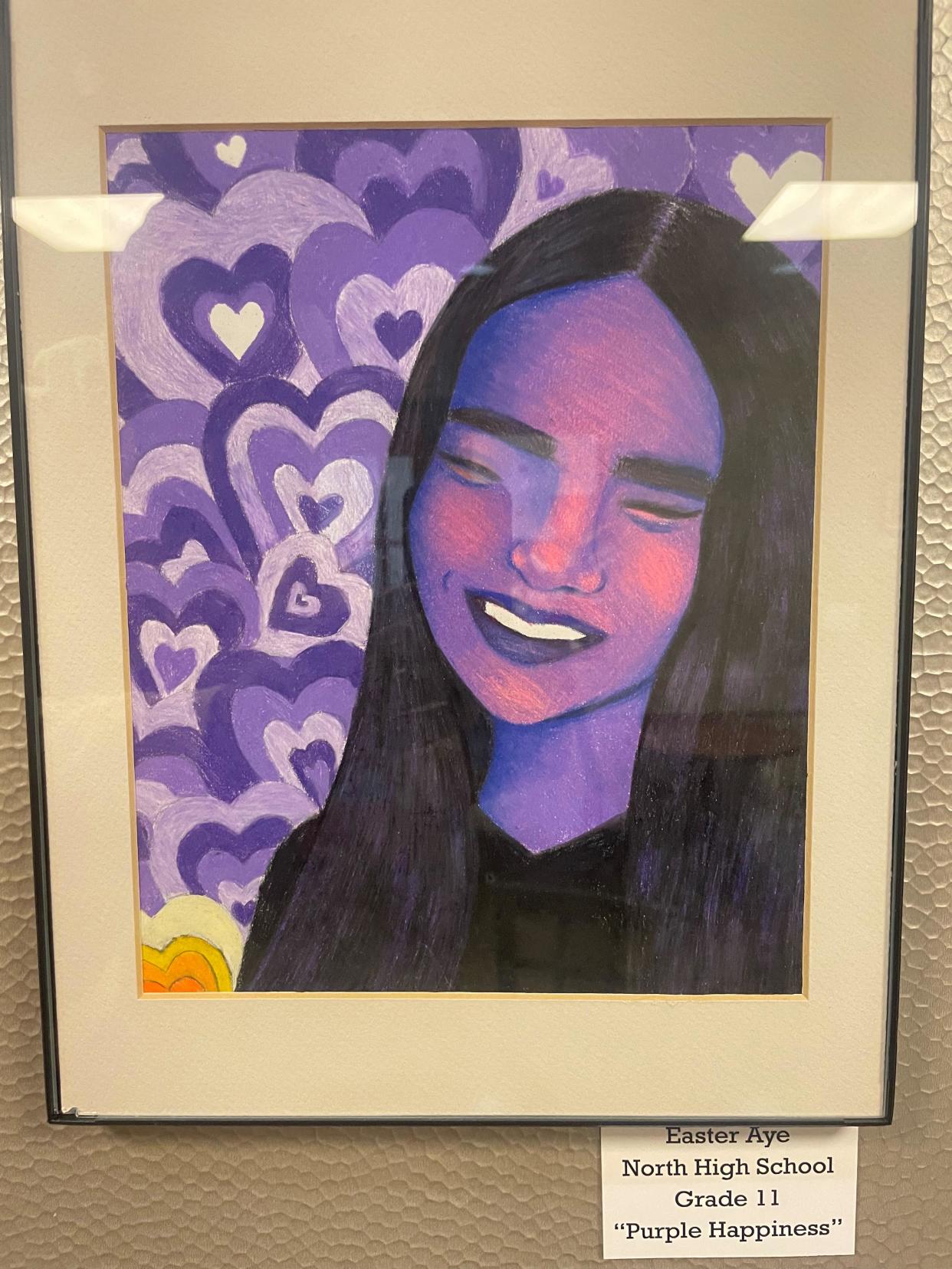 North High School junior Easter Aye's "Purple Happiness" is amid the student artwork featured at NoHi's Creative and Culinary Arts Student Showcase Wednesday.