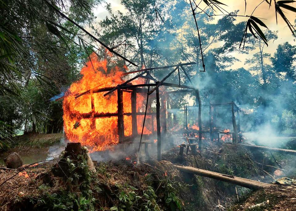 A Rohingya village burning in Rakhine state on Sept. 7.