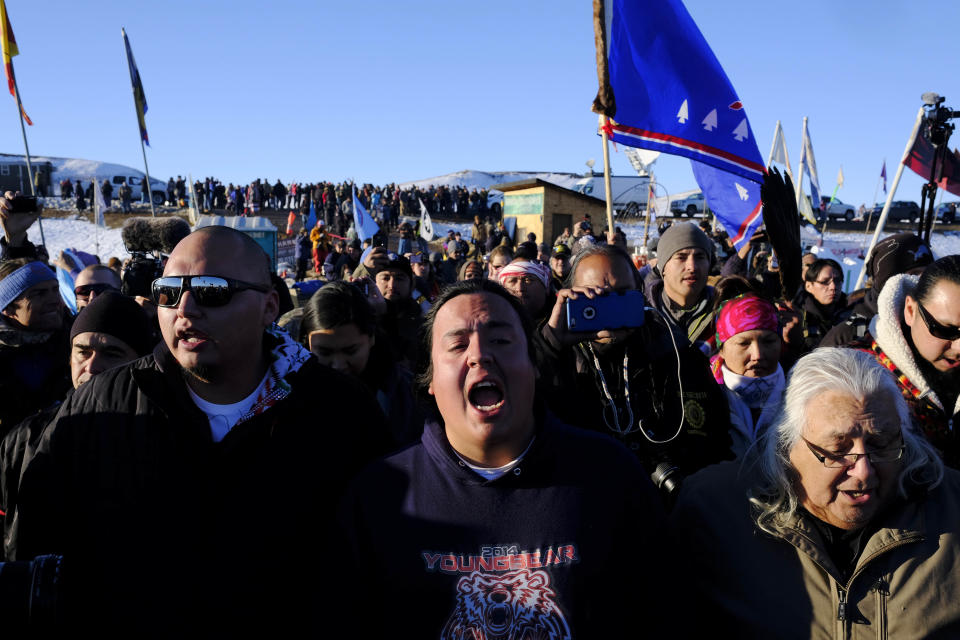 Dakota Access Pipeline protesters celebrate as they march back to the Oceti Sakowin campground after they found out the Army Corps of Engineers denied the easement to drill under Lake Oahe on Sunday, Dec. 4, 2016. (Photo: Josh Morgan for The Huffington Post)