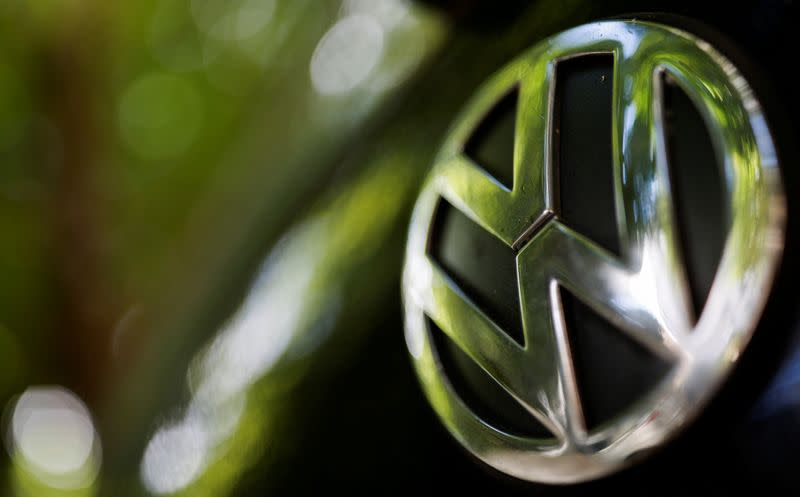 FILE PHOTO: A logo of German carmaker Volkswagen is seen on a car parked on a street in Paris