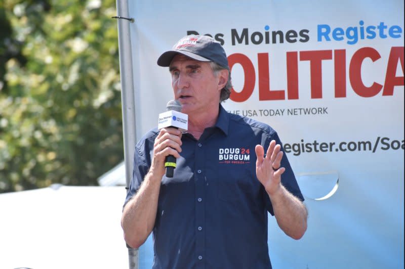 North Dakota Gov. Doug Burgum delivers a stump speech from the Des Moines Register Political Soapbox at the Iowa State Fair in Des Moines on Thursday. Photo by Joe Fisher/UPI