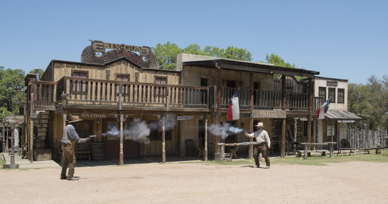 Reenactments of Old West gunfights, like this one at a tourist attraction in Texas in 2014, are part of the mythology underpinning the United States' gun culture. <a href="https://www.loc.gov/item/2014632859/" rel="nofollow noopener" target="_blank" data-ylk="slk:Carol M. Highsmith via Library of Congress;elm:context_link;itc:0;sec:content-canvas" class="link ">Carol M. Highsmith via Library of Congress</a>