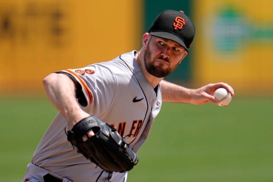 FILE – San Francisco Giants starting pitcher Alex Wood delivers during the first inning of a baseball game against the Pittsburgh Pirates in Pittsburgh, Sunday, July 16, 2023. Wood has agreed to an $8.5 million, one-year contract with the Oakland Athletics. (AP Photo/Gene J. Puskar, File)