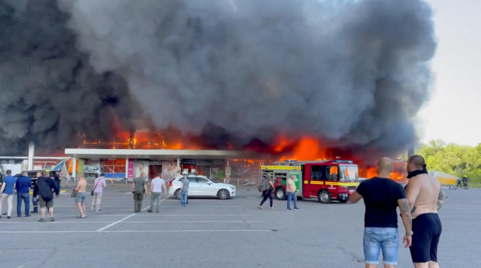 Smoke rises from a shopping mall hit by a Russian missile strike, as Russia's attack on Ukraine continues, in Kremenchuk, central Ukraine, June 27, 2022. / Credit: Telegram/V_Zelenskiy_official/Handout/REUTERS