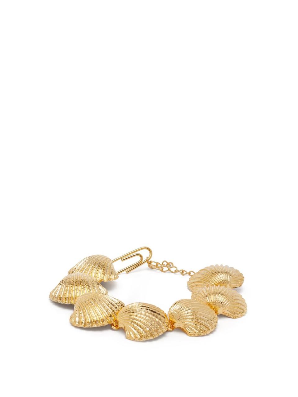 <p>Gold-plated shell bracelet, £310, Aurélie Bidermann</p><p><a class="link " href="https://go.redirectingat.com?id=127X1599956&url=https%3A%2F%2Fwww.matchesfashion.com%2Fproducts%2FAur%25C3%25A9lie-Bidermann-Fortaleza-shell-18kt-gold-plated-bracelet-1298136&sref=https%3A%2F%2Fwww.townandcountrymag.com%2Fuk%2Fstyle%2Ffashion%2Fg32698495%2Fwhat-to-wear-seaside-staycation%2F" rel="nofollow noopener" target="_blank" data-ylk="slk:Shop now;elm:context_link;itc:0;sec:content-canvas">Shop now</a></p>