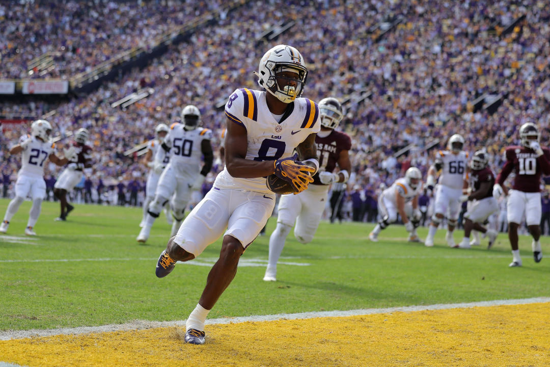 BATON ROUGE, LOUISIANA - NOVEMBER 25: Malik Nabers #8 of the LSU Tigers scores a touchdown during the first half against the Texas A&M Aggies at Tiger Stadium on November 25, 2023 in Baton Rouge, Louisiana. (Photo by Jonathan Bachman/Getty Images)