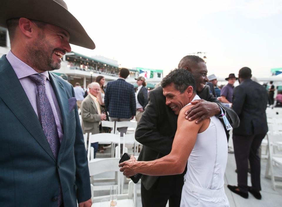 Trainer Larry Demeritte greets jockey Jesús Castañón after the pair drew the post position 13 at the 2024 Kentucky Derby draw opening night of the spring meet at Churchill Downs Saturday. It's Demeritte's first Derby ever with a horse he purchased for $11,000. Demeritte also is battling cancer and in the past was only given a few months to live. "God has a plan for me," he said. Story: https://www.courier-journal.com/story/sports/horses/kentucky-derby/2024/04/22/west-saratoga-trainer-larry-demeritte-kentucky-derby-field-gray-horse/73333515007/ April 27, 2024