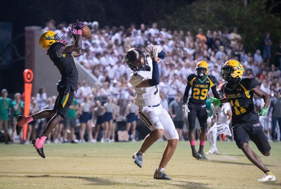 Ja'bril Rawls (6) intercepts a pass intended for Kohen Kember (3) at the goal line during the Gulf Breeze vs Catholic football game at Pensacola Catholic High School in Pensacola on Thursday, Oct. 6, 2022.