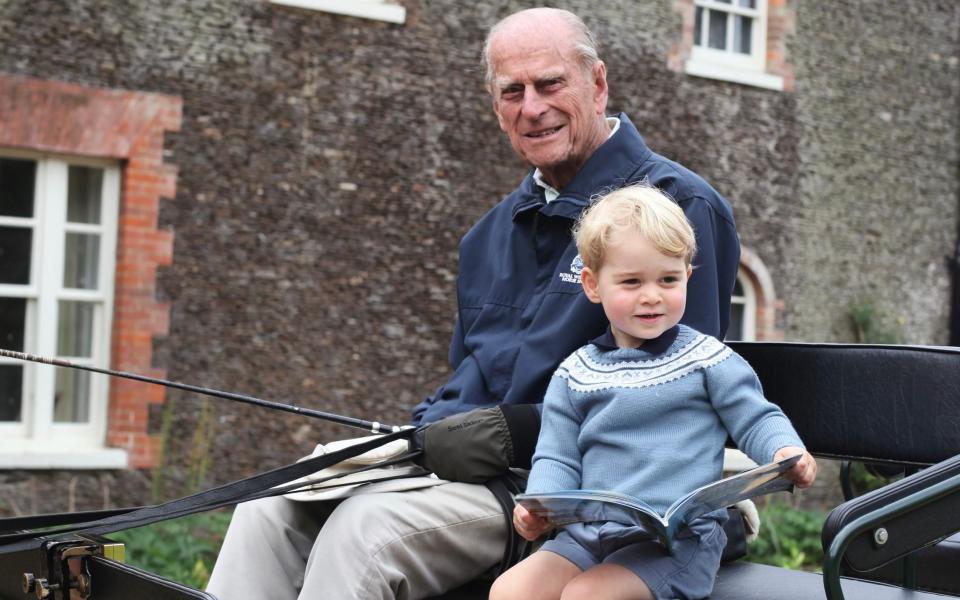 Prince Philip, the Duke of Edinburgh, with Prince George - Duchess of Cambridge