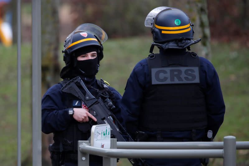 French police secure an area after a knife attack in a public park in Villejuif