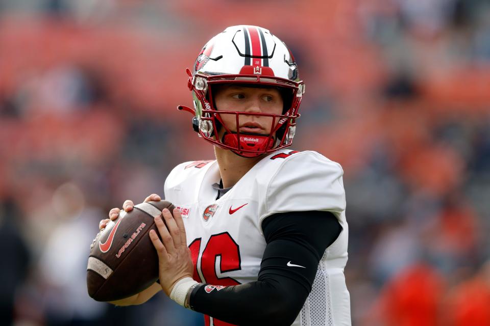 Western Kentucky quarterback Austin Reed warms up before an NCAA college football game against Auburn Saturday, Nov. 19, 2022, in Auburn, Ala. (AP Photo/Butch Dill)